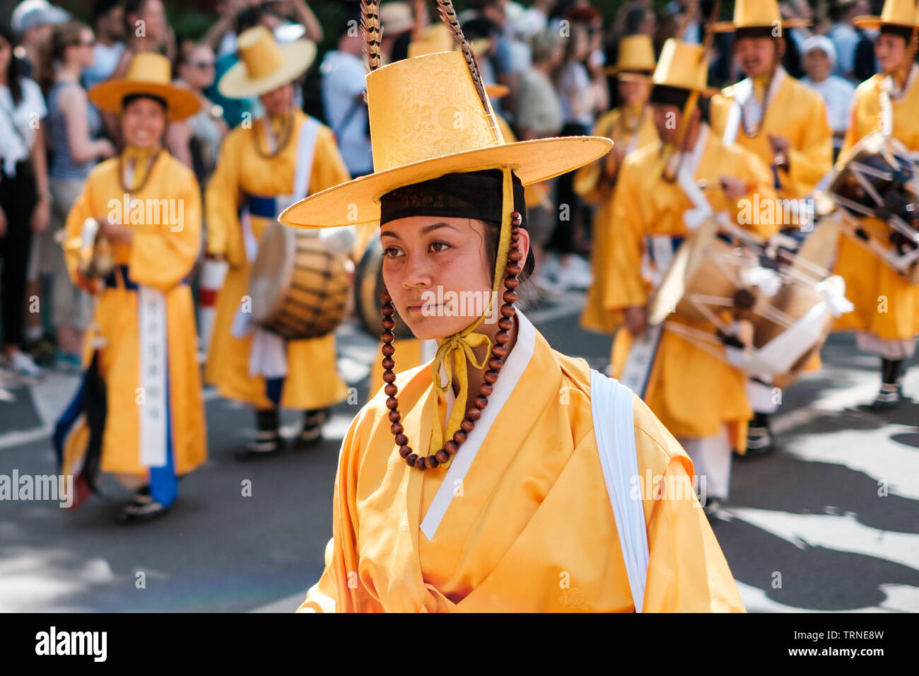 Berlin, Germany - june 2019: Korean people in traditional costumes performing at Karneval der Kulturen (Carnival of Cultures) in Berlin Stock Photo