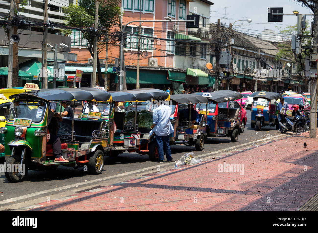 Row of Tuk Tuk's in central Bangkok Stock Photo