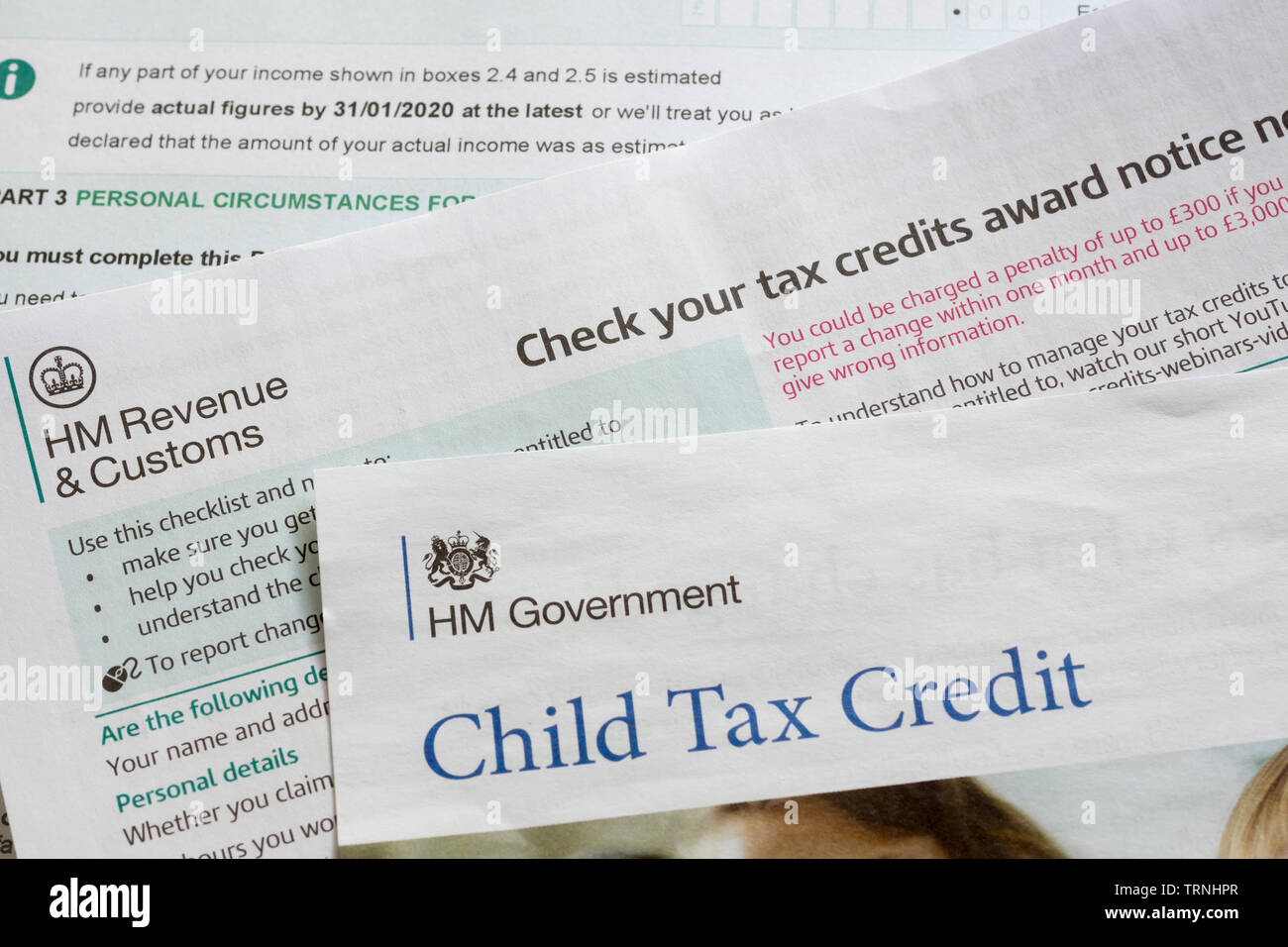 British child tax credit renewal reminder for government social security benefits for people in low paid employment with children Stock Photo
