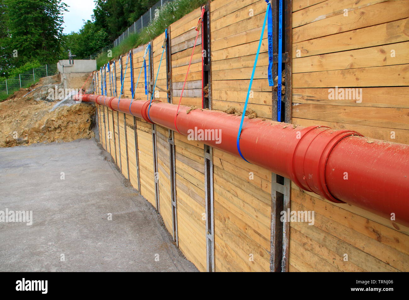Sewer pipe in the inlet of a sewage treatment plant was laid for rebuilding work Stock Photo