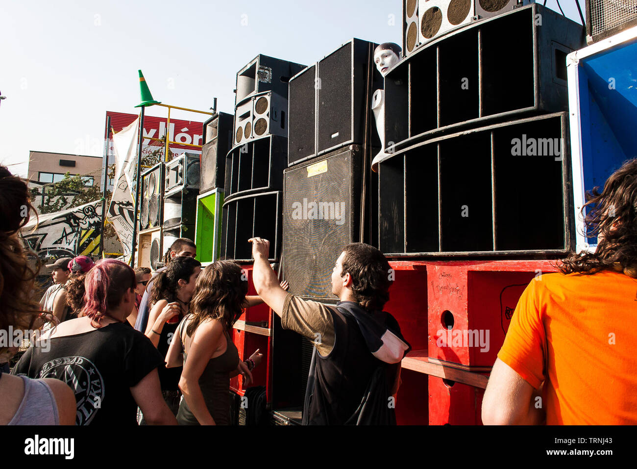 Crowd dancing in front to huge sound system at Anti-Sonar free illegal  squat party rave outside Sonar Festival, Barcelona, Spain Stock Photo -  Alamy