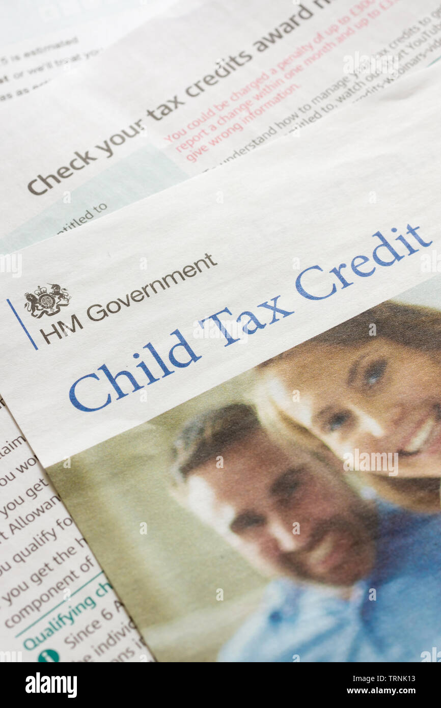 HMRC child tax credit renewal reminder for government social security benefits for people in low paid employment income with children Stock Photo