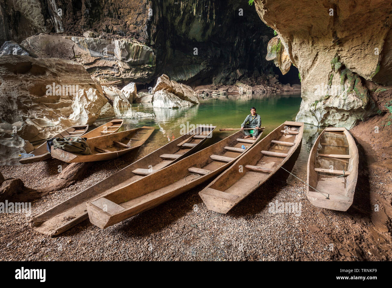 Tourist boats with guide, Xe Bang Fai river cave entrance, Laos Stock Photo  - Alamy