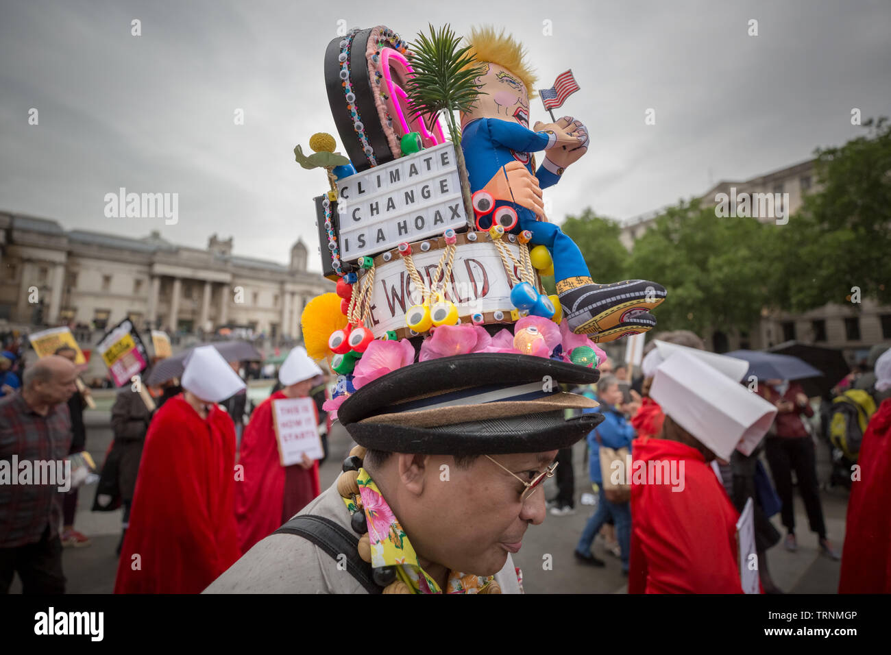 Protester with Donald Trump parody hat design joins the demonstration in Trafalgar Square as part of the protests against US president Donald Trump's UK state visit. Stock Photo