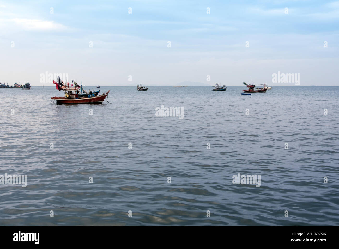 Small Fishing Boats coastal drift after returning from fishing Stock Photo