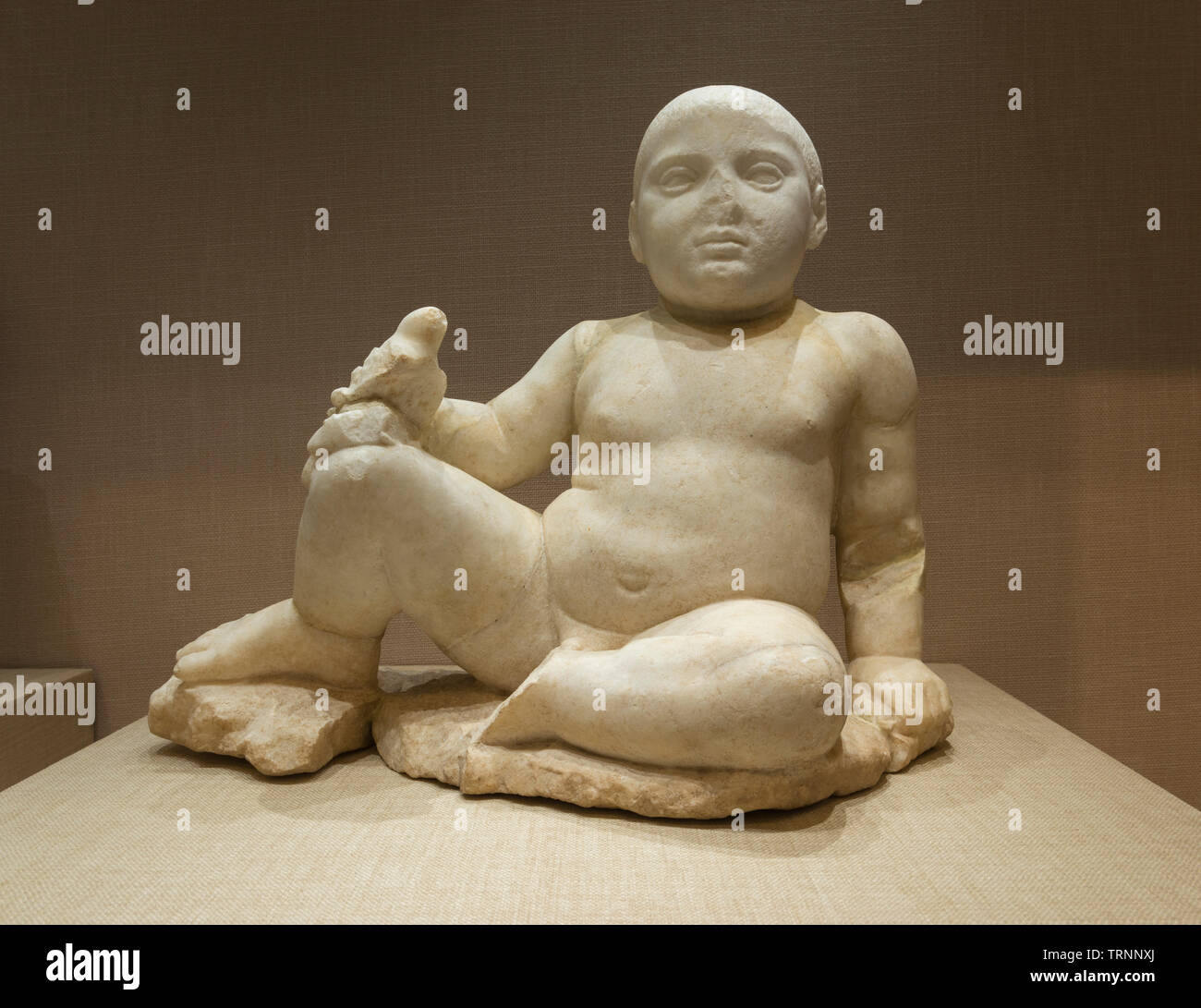 Marble Statue of a Child. Mid 4th Century BC. Temple of Eshmun, Lebanon. Directorate General of Antiquities-Lebanon. Stock Photo