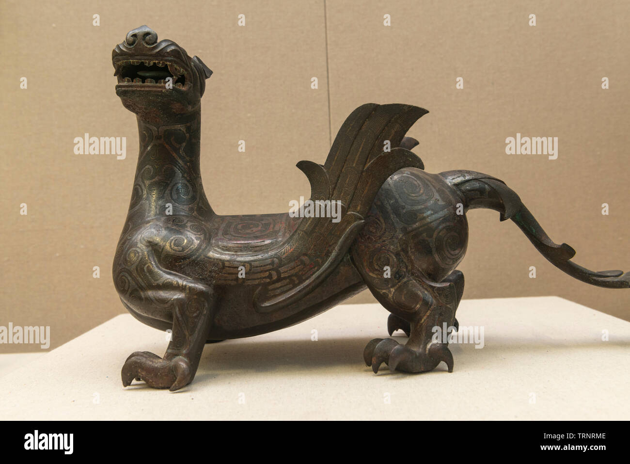 Bronze-inlaid-with-silver Mythical Animal. 475 BC-221 BC(The Warring States Period) Cultural Relics Institute Hebei Province, China Stock Photo