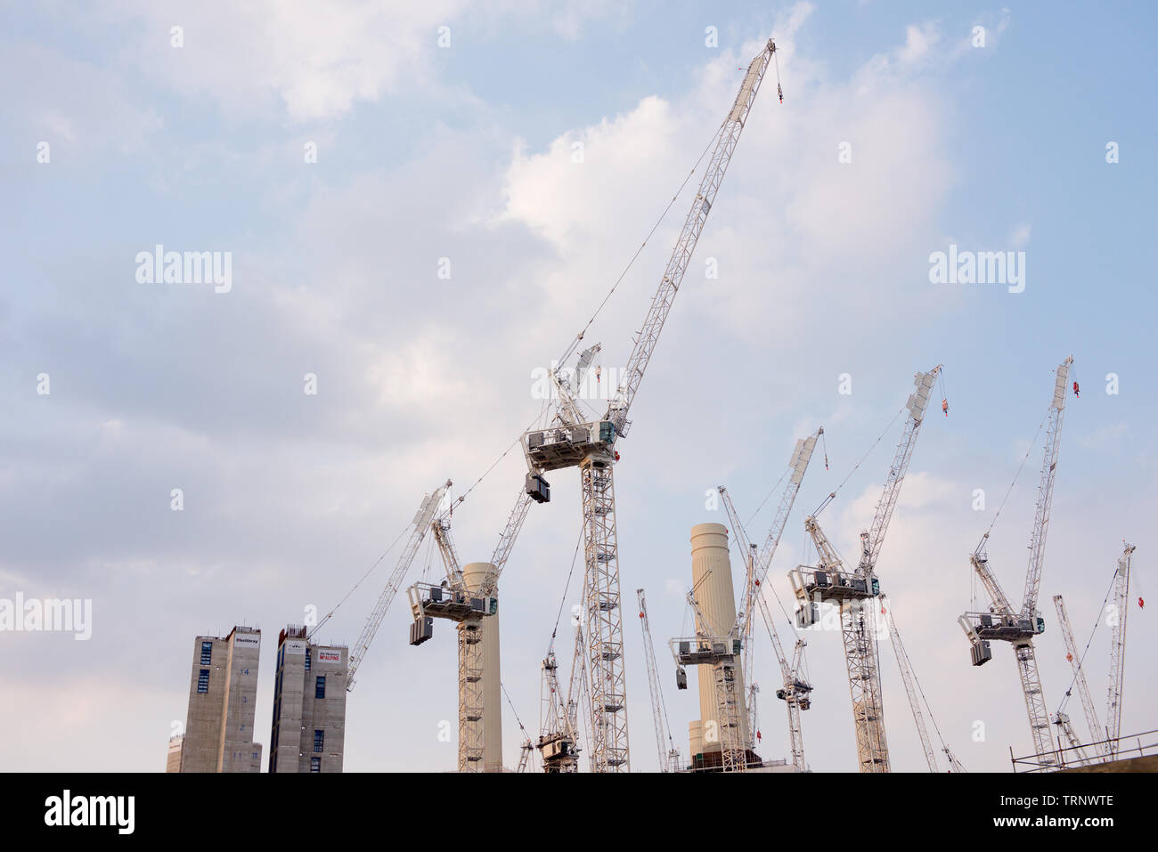 Group of Tower cranes on a construction site in London, England Stock