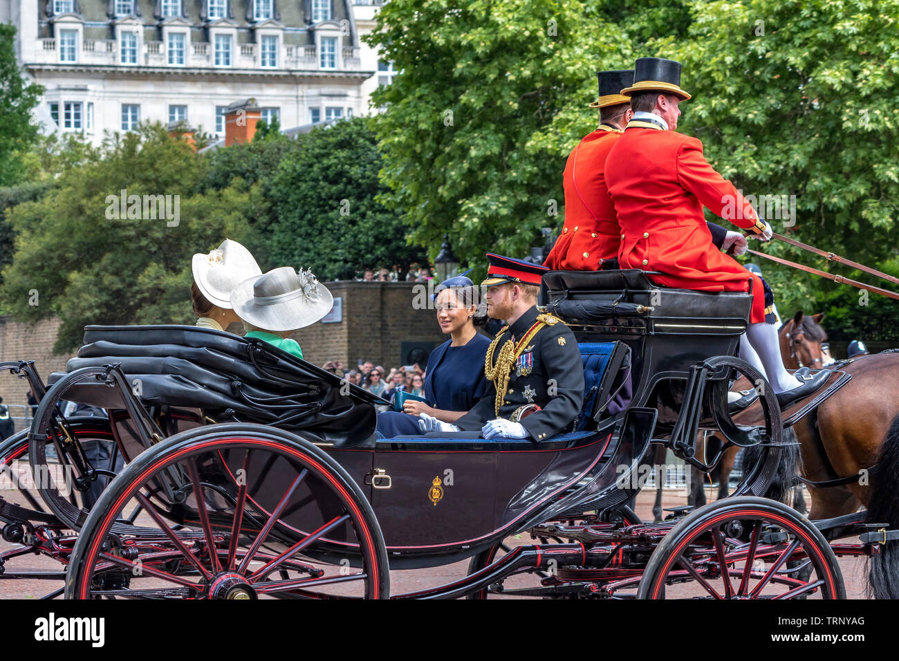 The Duke and  Duchess Of Sussex  riding along The Mall in a carriage at rooping The Colour, London, UK, 2019 Stock Photo