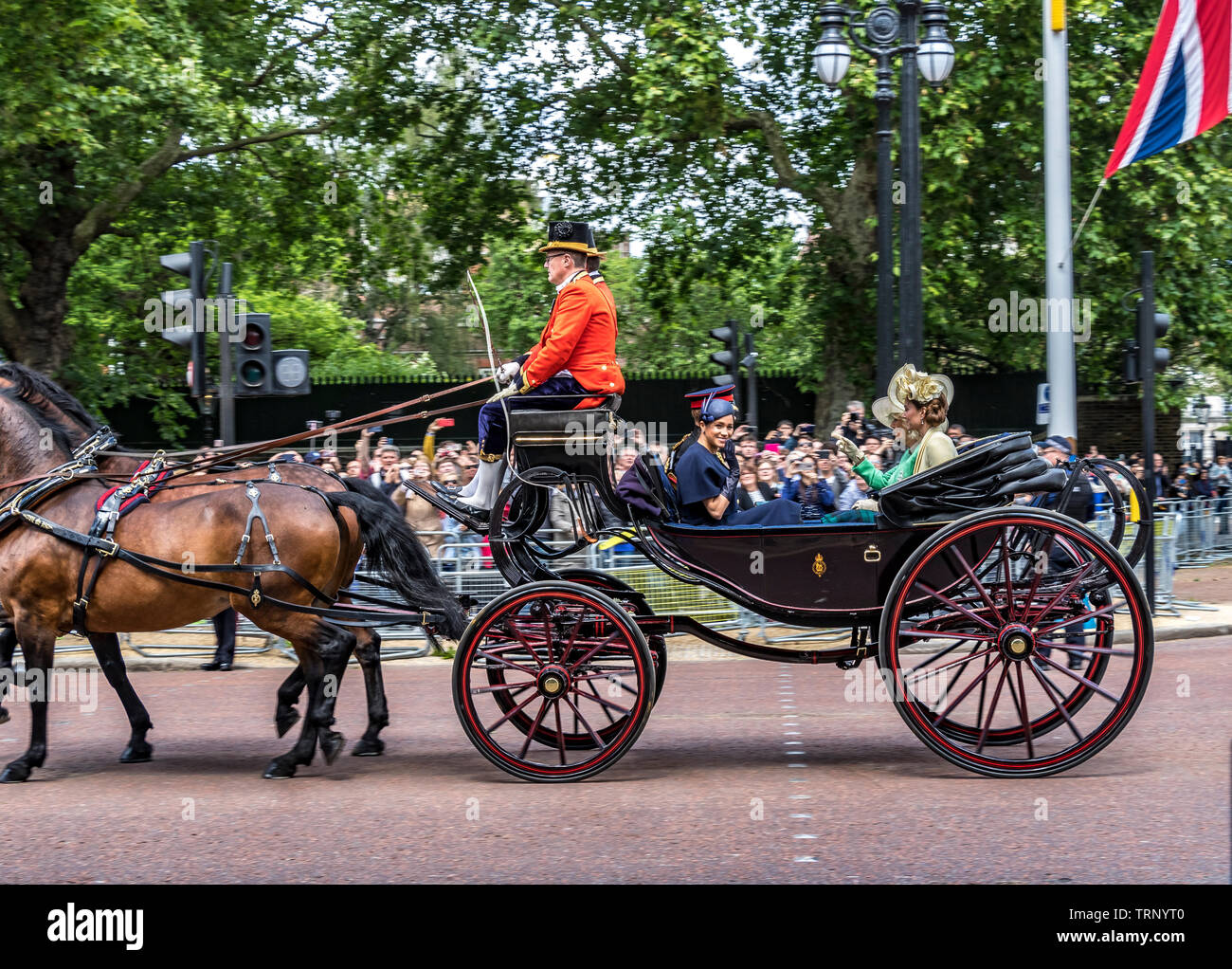 The Duchess Of Sussex rides in a carriage with The Duchess Of Cambridge Trooping The Colour , London,UK, 2019 Stock Photo