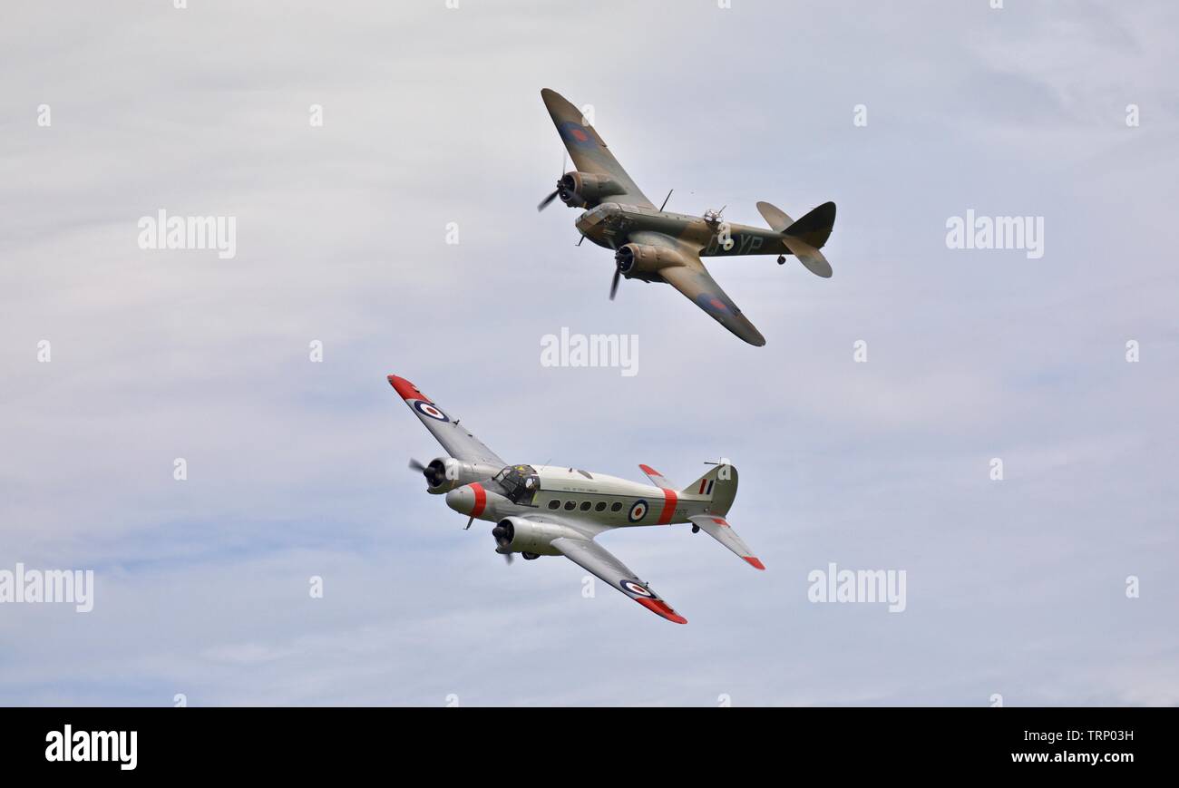 Avro C19 Anson flying in formation with the Bristol Blenheim Mk1 at the 2019 Shuttleworth Flying Festival Stock Photo
