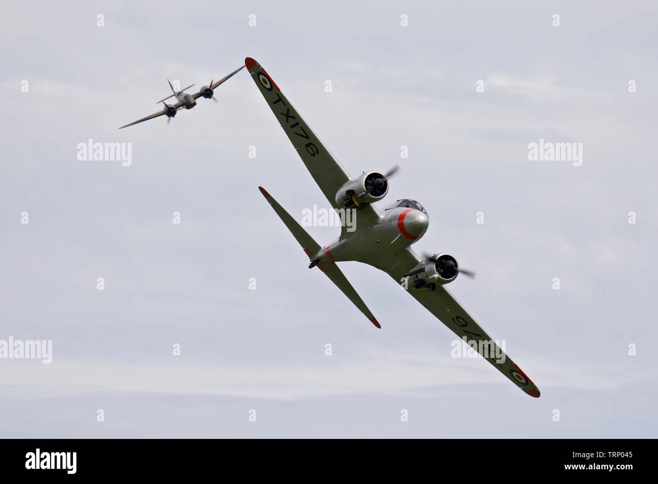 Avro C19 Anson flying in formation with the Bristol Blenheim Mk1 at the 2019 Shuttleworth Flying Festival Stock Photo