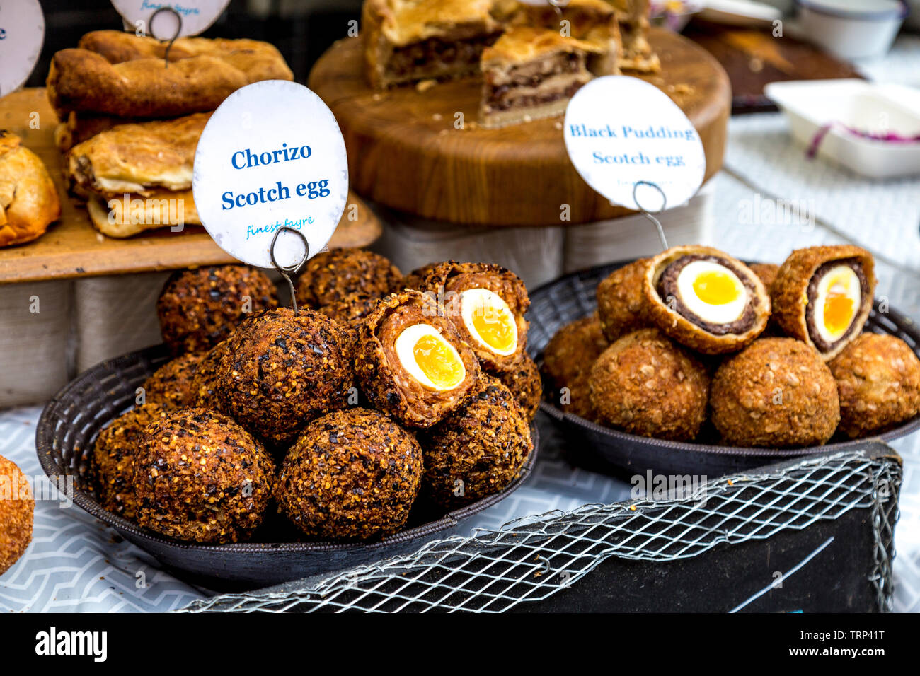 Street food stall with scotch eggs (Finest Fayre Scotch Eggs)  at Maltby Street Market, London, UK Stock Photo
