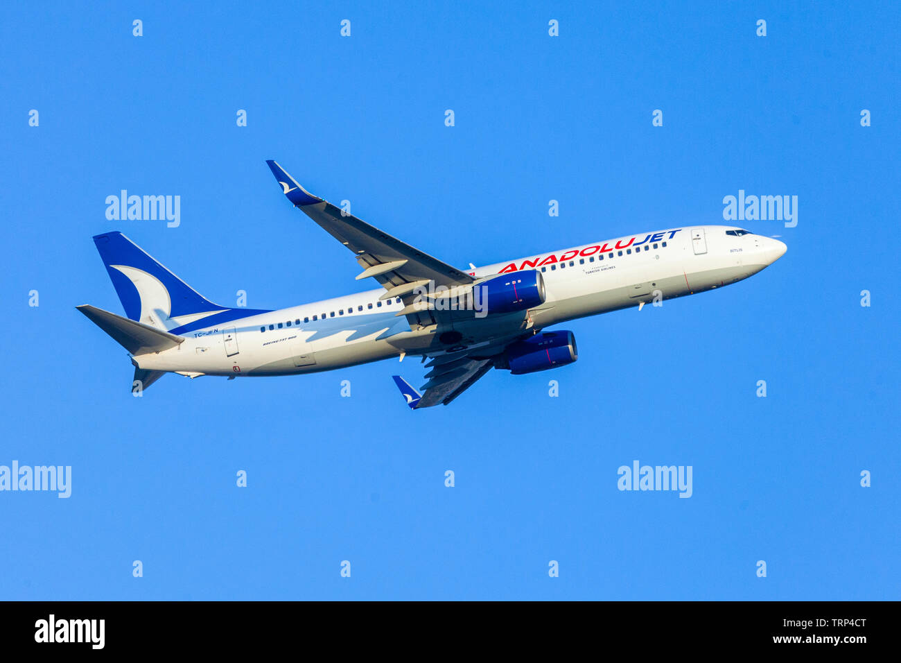 ANTALYA / TURKEY - JUNE 6, 2019: Boing 737-800 from Anadolujet flies over airport Antalya, Turkey. Stock Photo