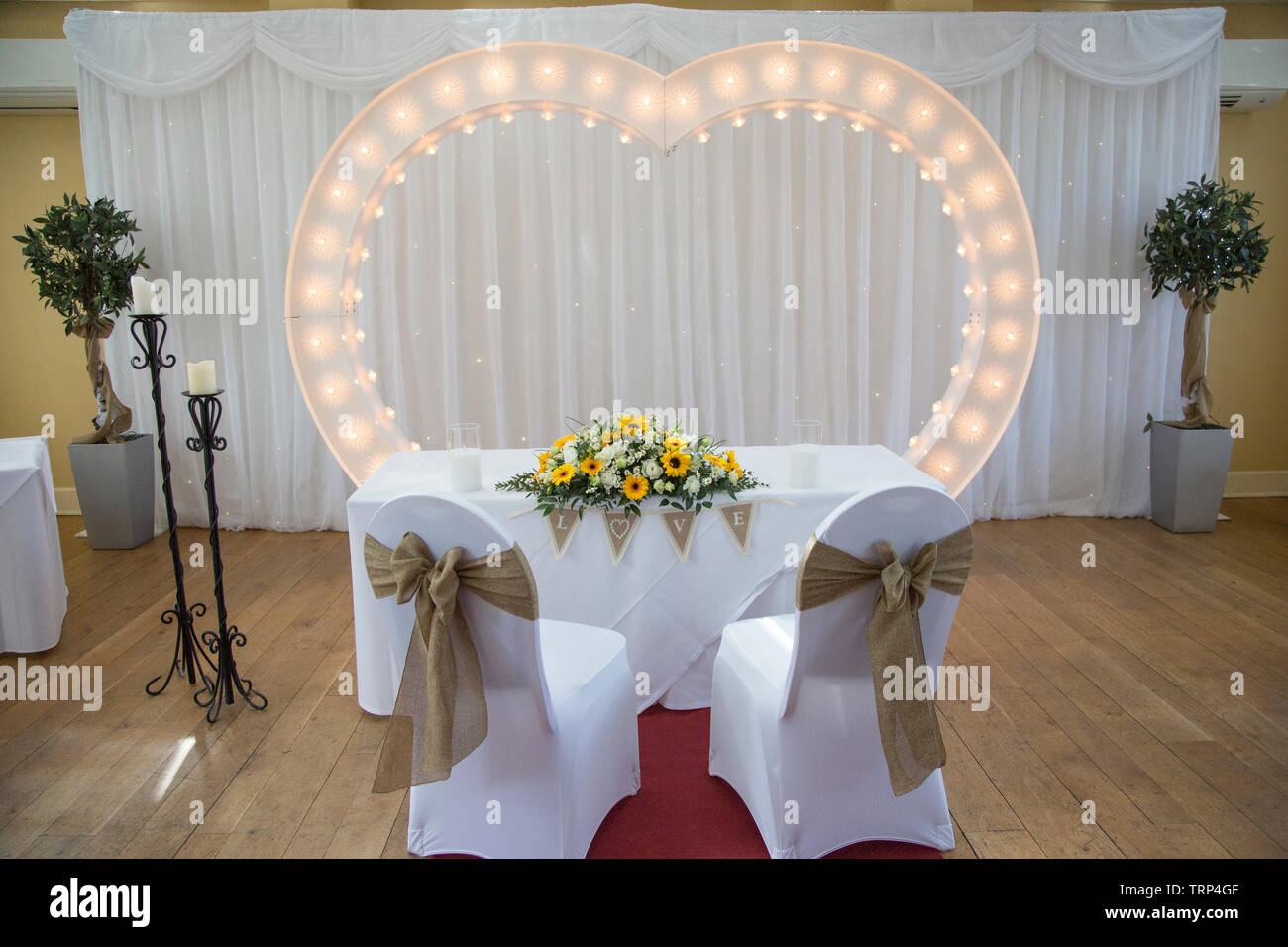 Floral Decorations On Wedding Day Tables At The Wedding Reception