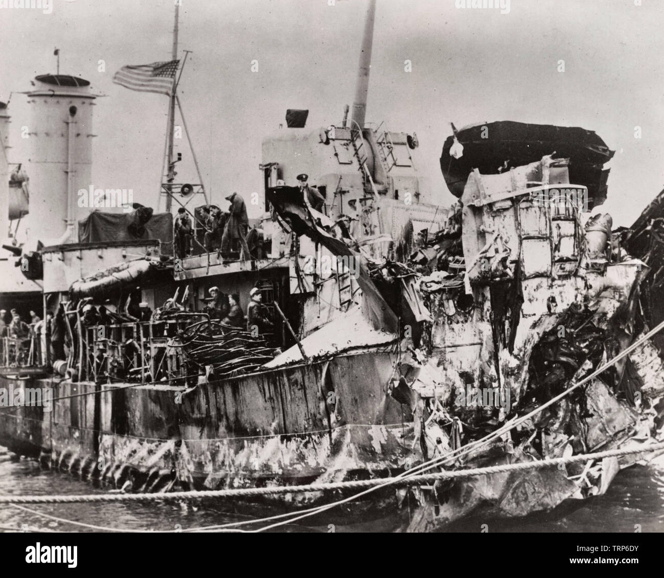 USS Nelson (DD-623) after she sustained damage from torpedo attack. On the night of June 12, 1944, while anchored in position No. 13 on the 'Dixie Line' as part of the anti-submarine and E-boat screen around the Omaha beachhead at Normandy, USS Nelson was struck by an E-boat torpedo which blew off her stern and No. 4 gun mount. Stock Photo