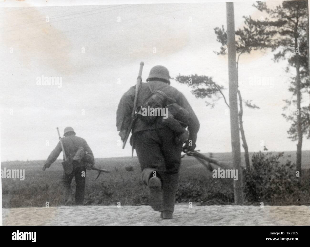 German Soldiers rush across a road during Operation Barbarossa 1941 Stock Photo