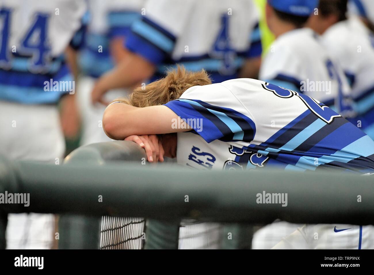 Player reacting to his team's loss in a state championship title game. USA. Stock Photo