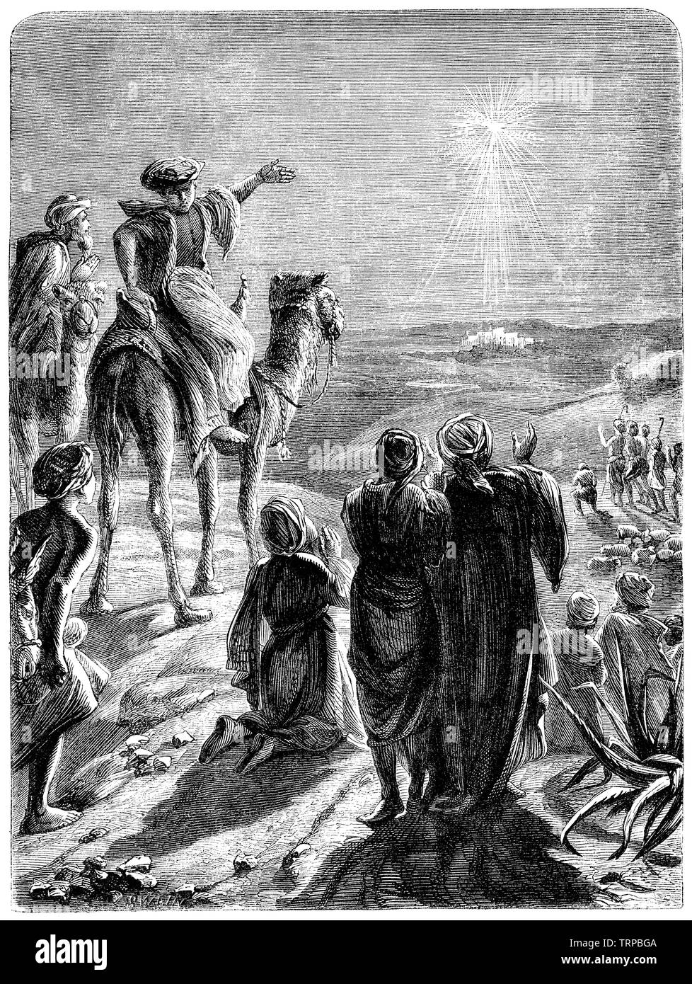 1872 engraving of the Three Wise Men following the star to the birth of Jesus Christ in Bethlehem. Stock Photo
