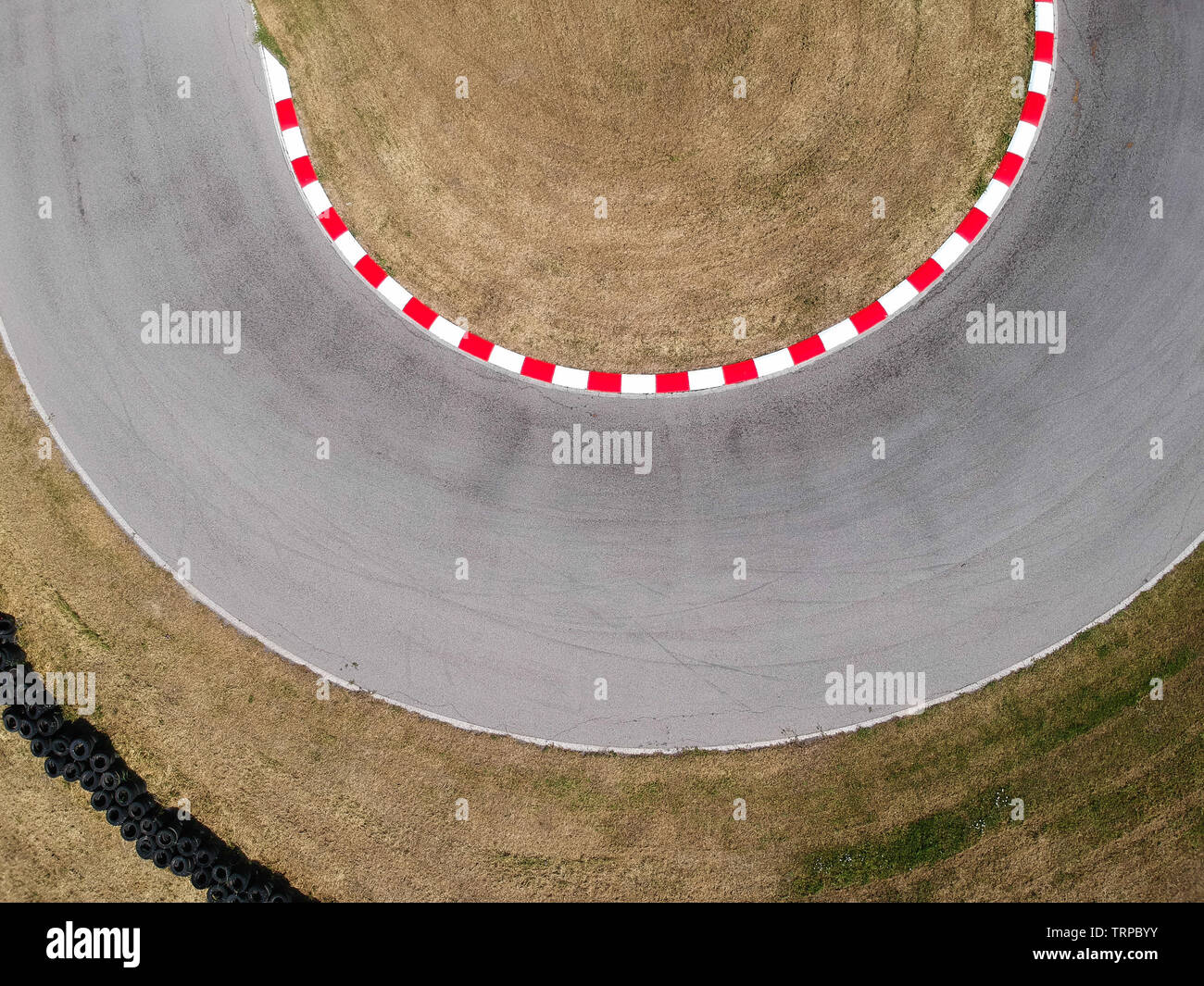 Curves on karting race track, aerial view background. Stock Photo