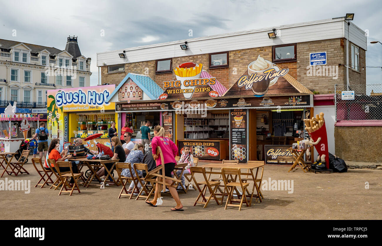 Seafront takeout fish and chip shop and slush puppy stall in the