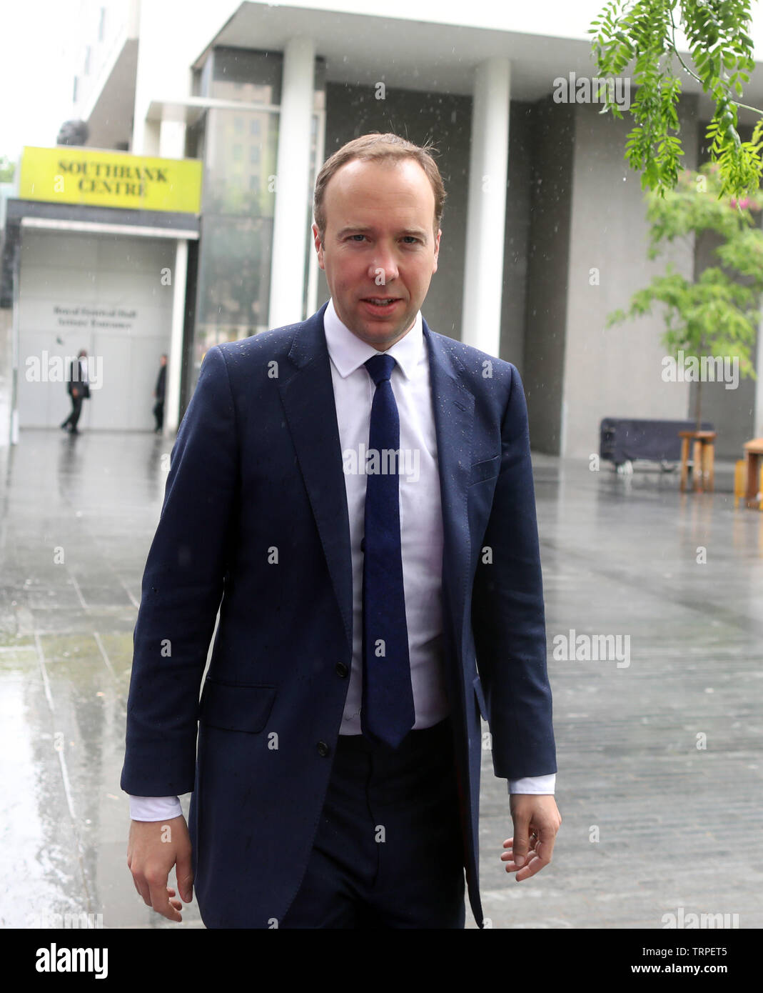 Pic shows: Braving the rain without an umbrella squeaky clean Matt Hancock leaves his press launch at the Royal Festival Hall today  with the   “ Stock Photo