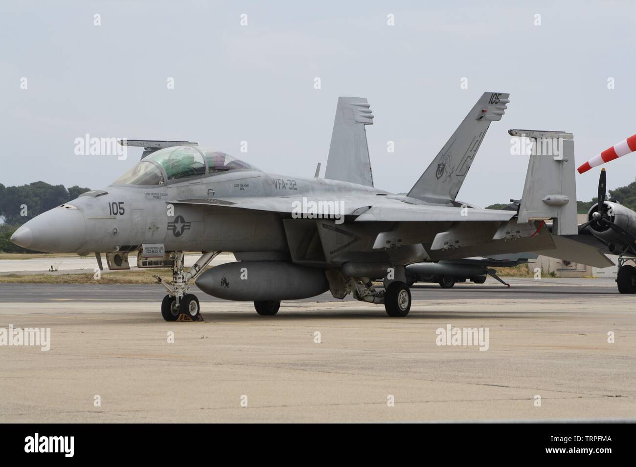 Boeing F/A-18F Super Hornet AC-105 from VFA-32 'Fighting Swordsmen' (crew pilot Derrick 'Probes' Dudash, operator Tim 'Awol' Henry) on the airfield Stock Photo