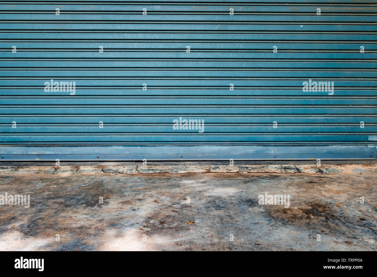 Pattern garage door and mortar floor Stock Photo