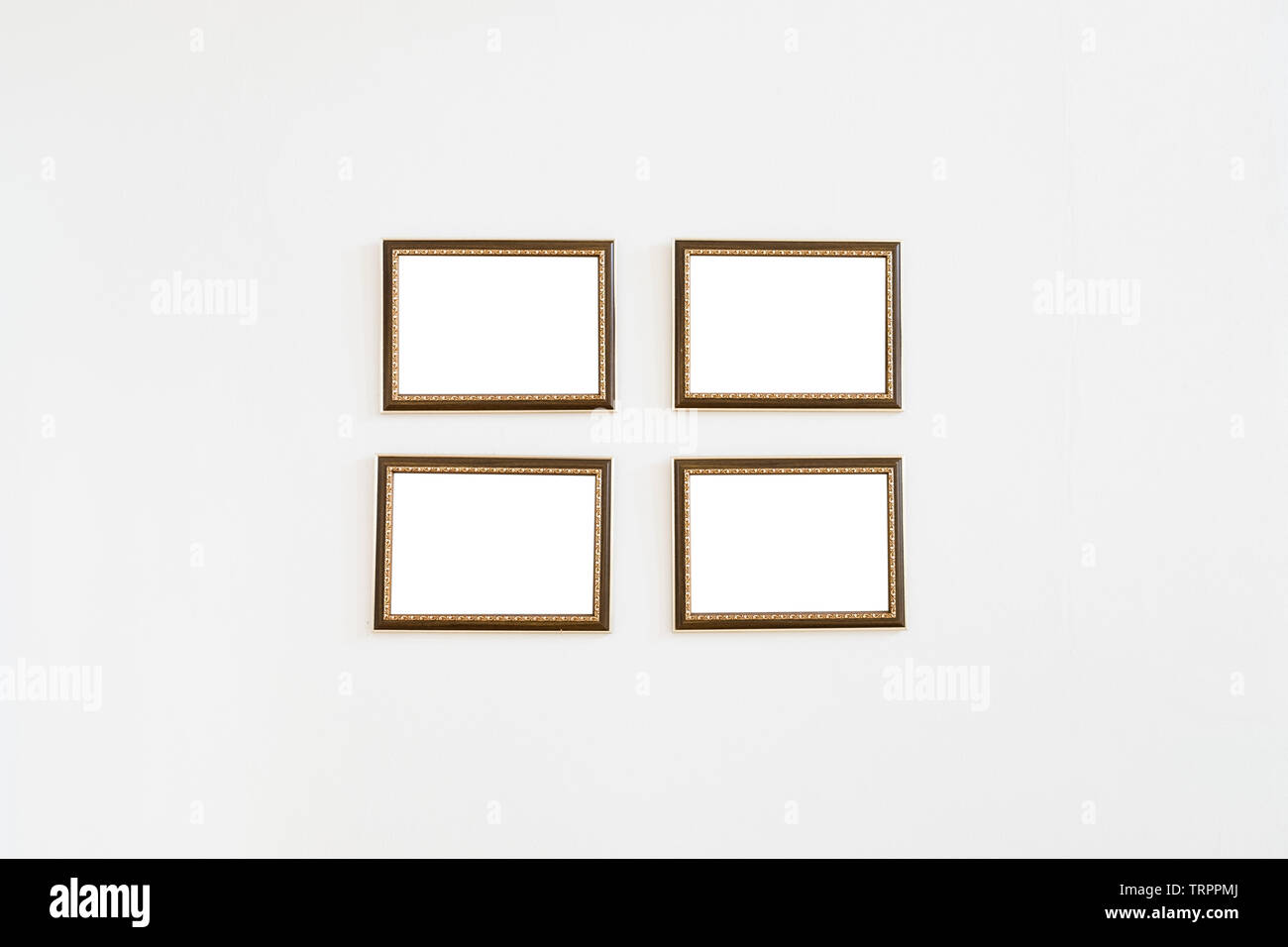 Picture frame wooden four on cement wall Stock Photo