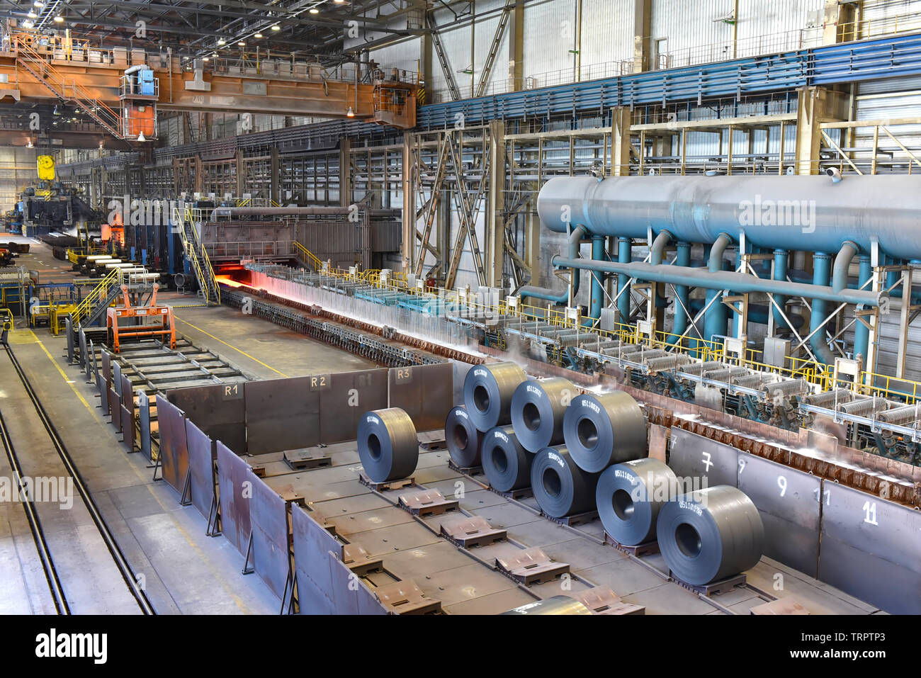 industrial plant for the production of sheet metal in a steel mill Stock Photo