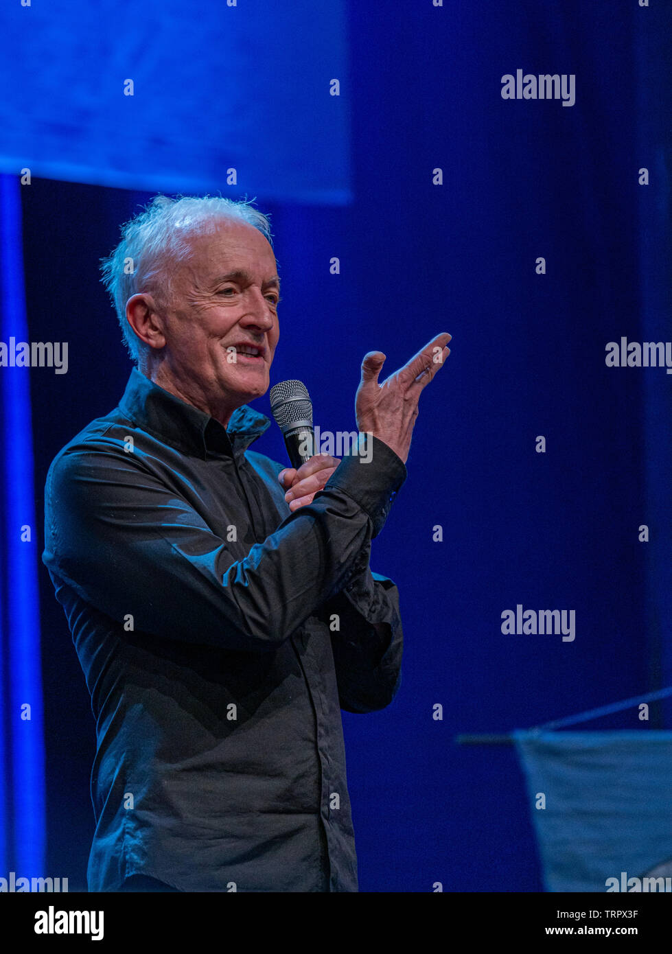 Bonn, Germany - June 8 2019: Anthony Daniels (*1946, English actor - C-3PO in Star Wars) talks about his experiences in Star Wars at FedCon 28 Stock Photo
