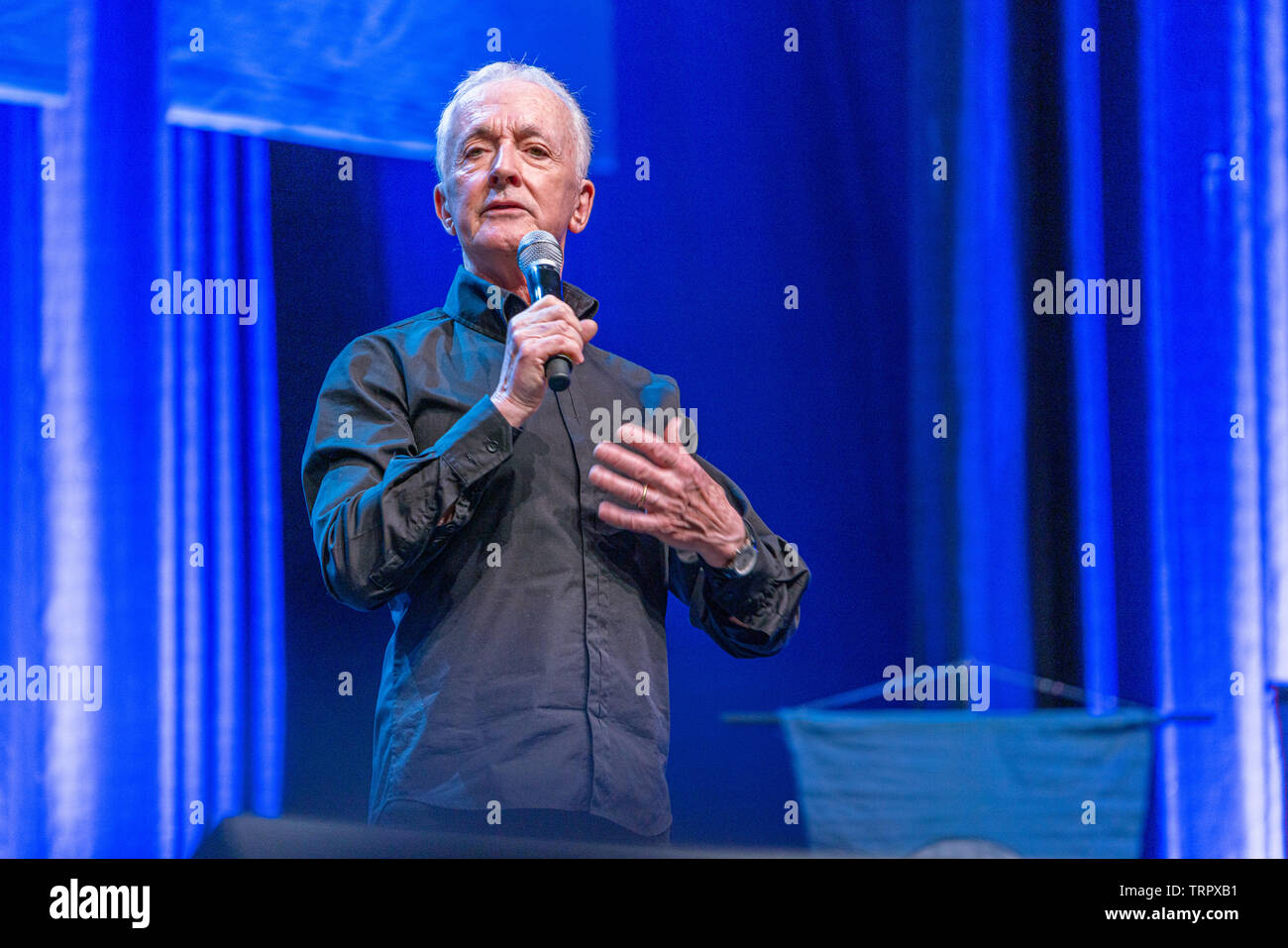 Bonn, Germany - June 8 2019: Anthony Daniels (*1946, English actor - C-3PO in Star Wars) talks about his experiences in Star Wars at FedCon 28 Stock Photo