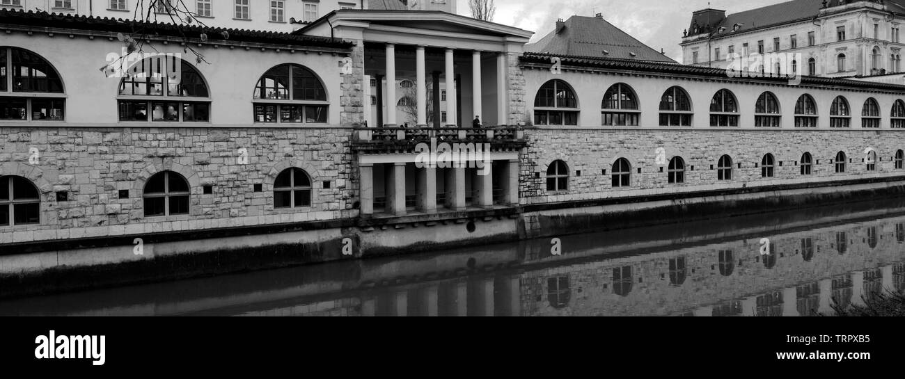 The Central Market buildings on the banks of the Ljubljanica River, Ljubljana city, Slovenia, Europe Stock Photo