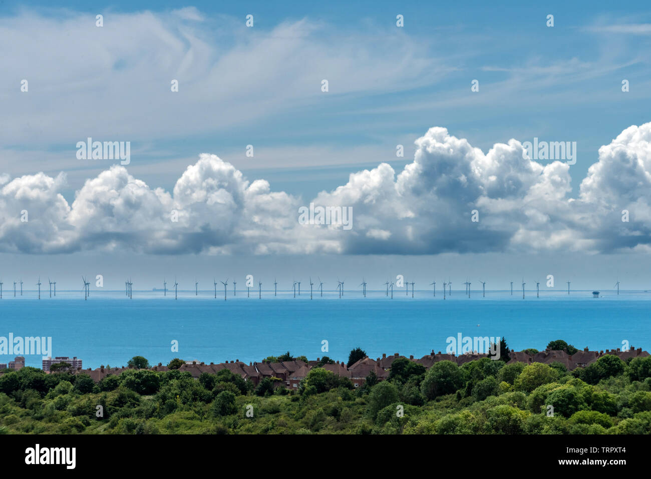 South Downs, UK. 11th June, 2019. Changeable weather conditions in the English Channel at the Rampion Wind Farm today Credit: Andrew Hasson/Alamy Live News Stock Photo