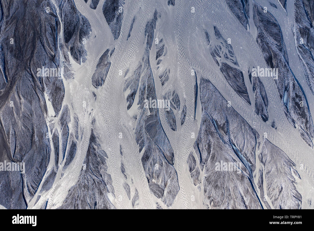 Aerial drone view of a huge riverbed and delta, glacial river system transporting deposits from the Eyjafjallajokull volcano glacier showing unique pa Stock Photo