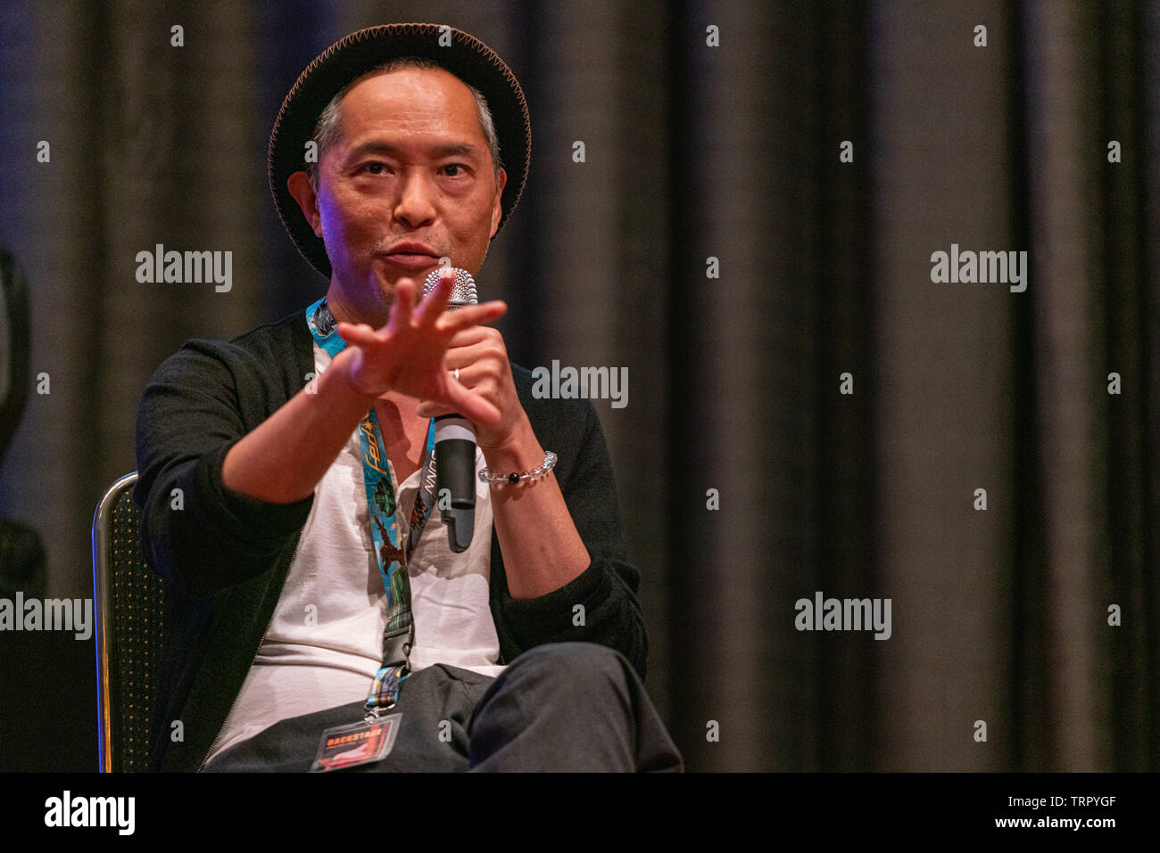 Bonn, Germany - June 8 2019: Ken Leung (*1970, American actor - Star Wars, LOST) talks about his experiences in the movie industry at FedCon 28 Stock Photo