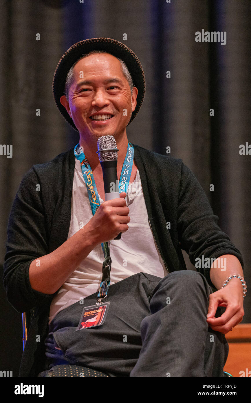 Bonn, Germany - June 8 2019: Ken Leung (*1970, American actor - Star Wars, LOST) talks about his experiences in the movie industry at FedCon 28 Stock Photo