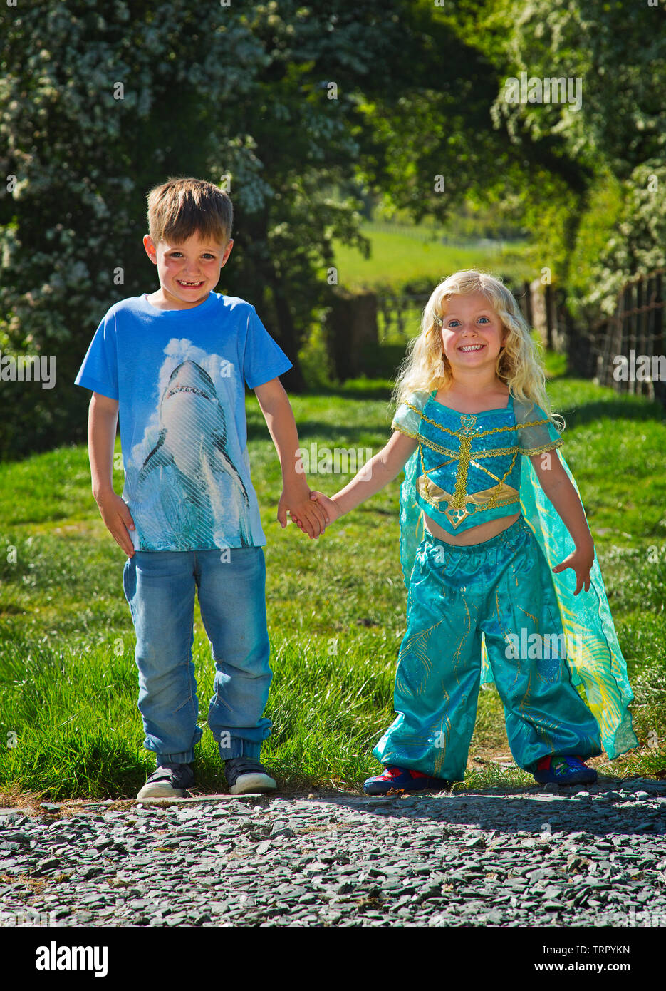Two little children a boy and a girl Stock Photo Alamy