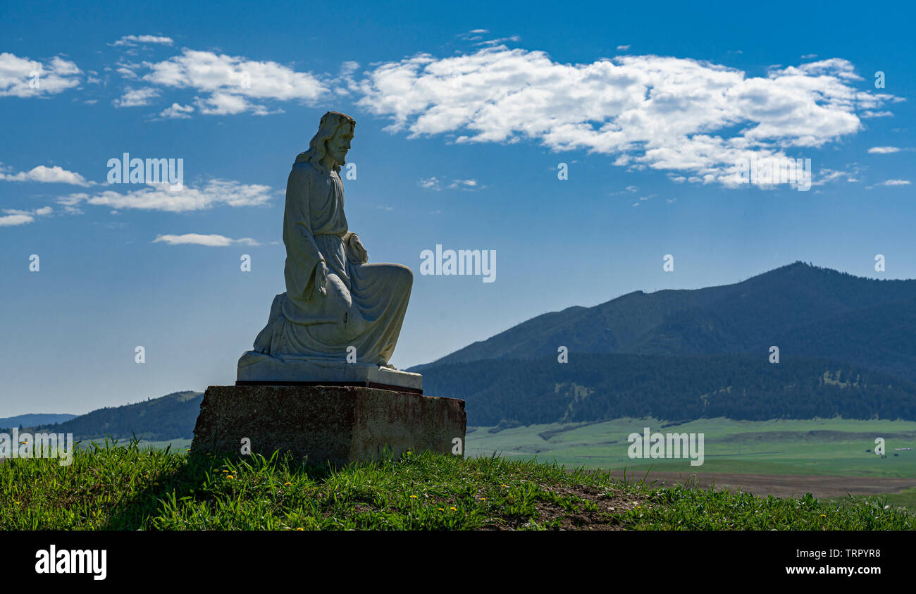 A statue of Jesus Christ in a cemetery north of Lewistown, Montana