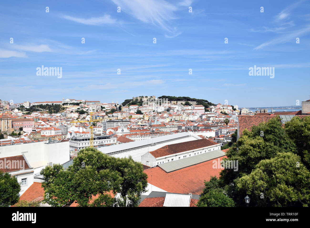 View of Lisbon & castle from Miradouro de Sao Pedro de Alcantara, Lisbon, Portugal, June 2019 Stock Photo