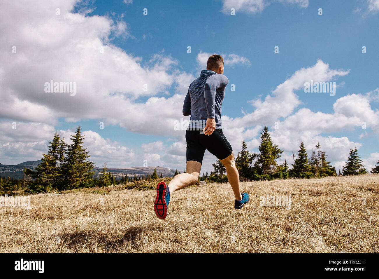 back male runner run crosscountry summer outdoor Stock Photo Alamy
