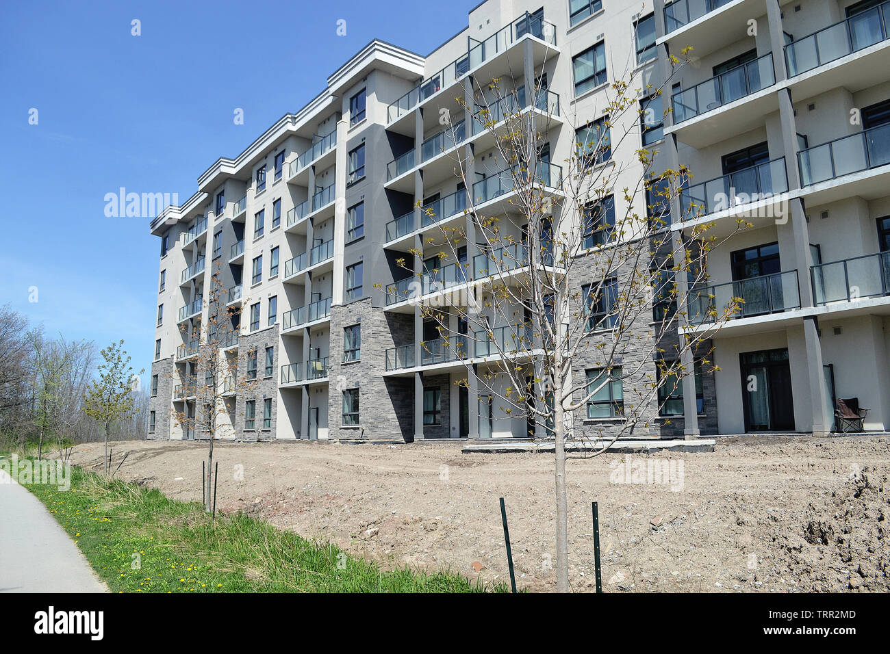 A new six story apartment building under construction close to the lake