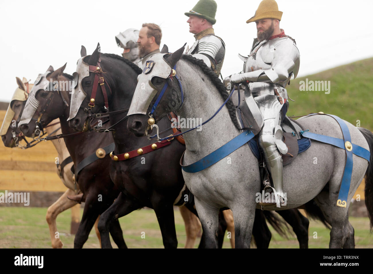 Four Knights in full Armour demonstrating their Horse riding skills, during  an English Heritage Jousting Tournament at Dover Castle, August 201 Stock  Photo - Alamy