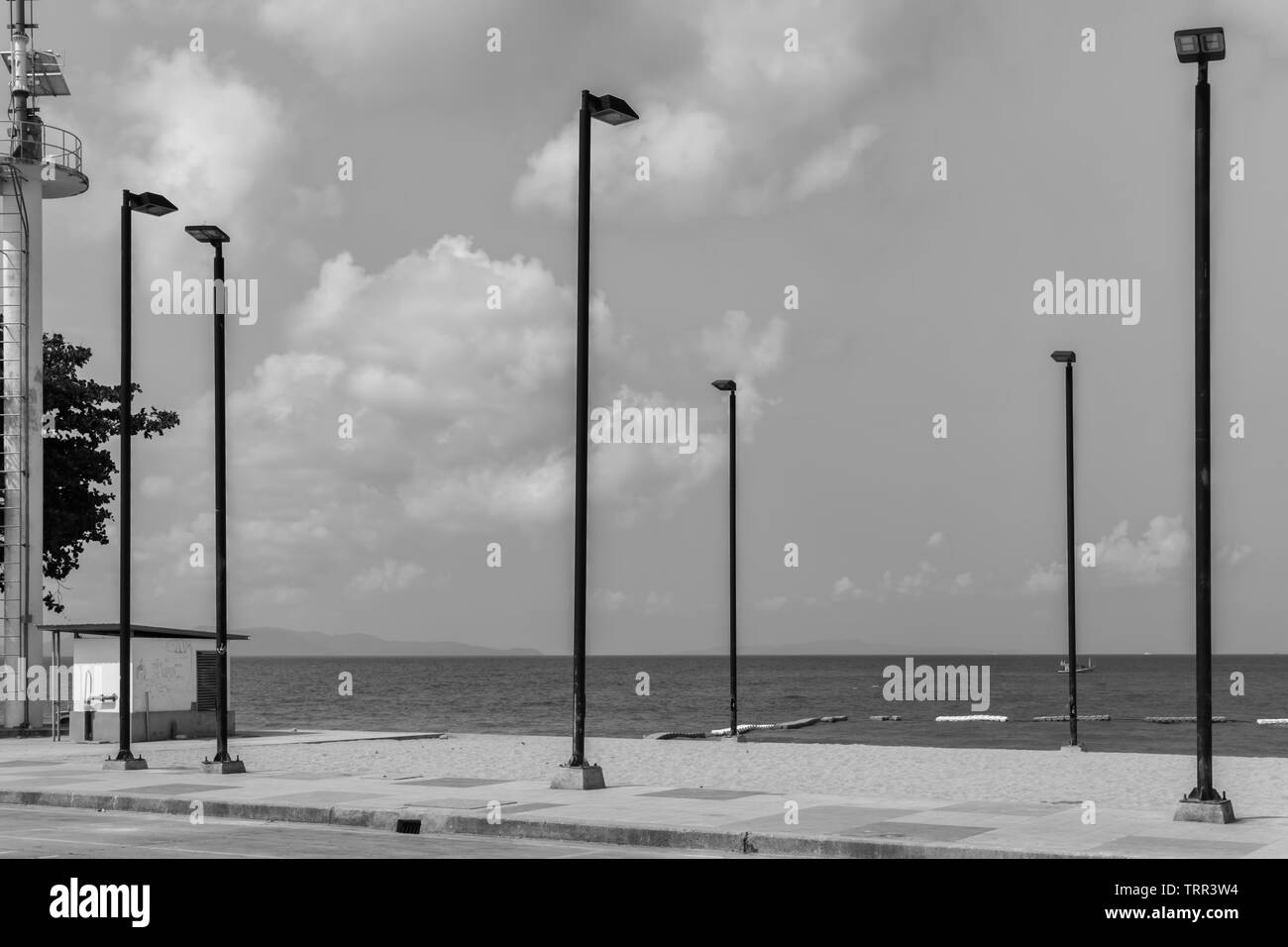 A couple of lights for night activities on the beach Stock Photo - Alamy