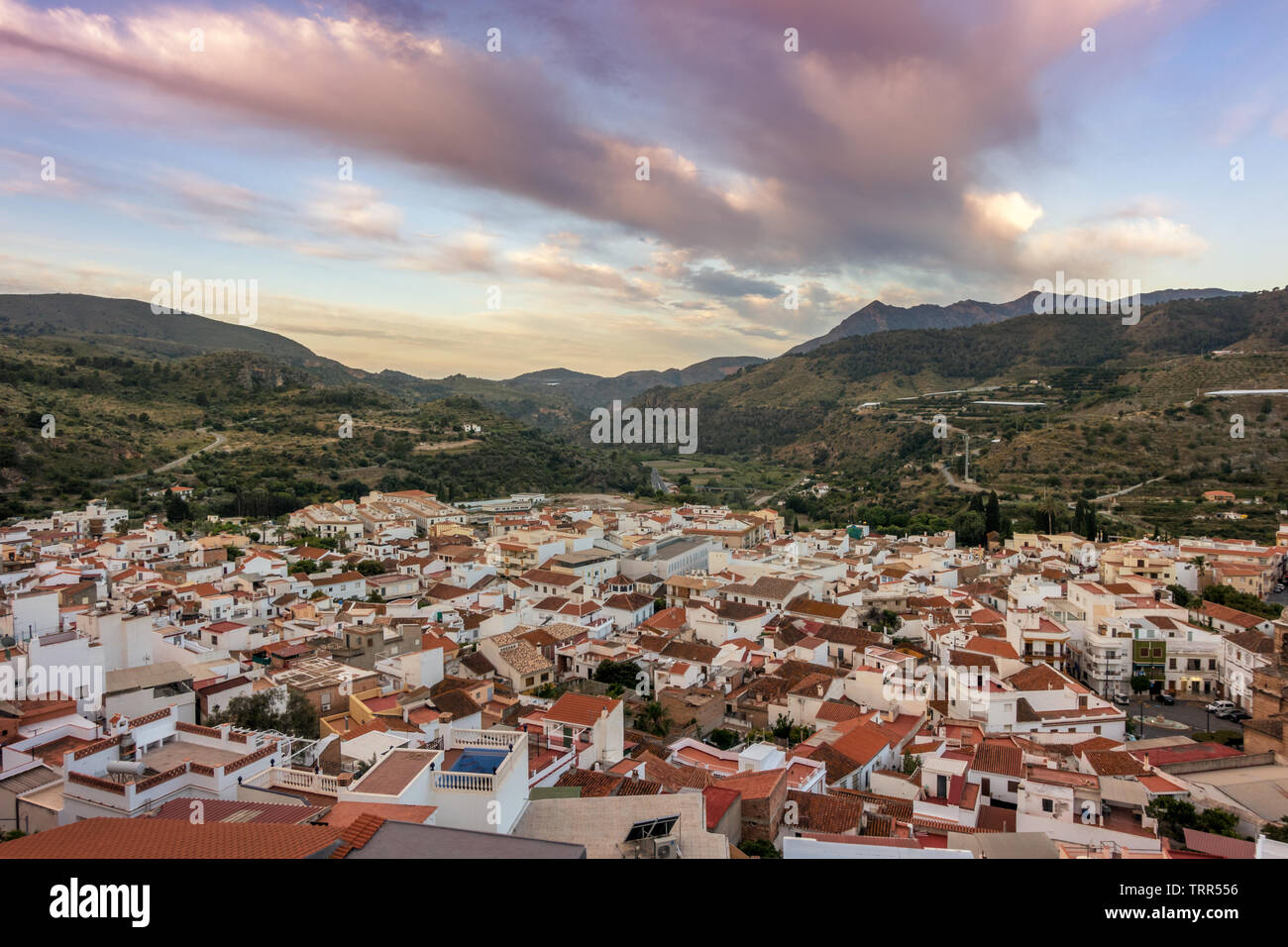 View of the town of white houses - Velez de Benaudalla - from above at sunrise, Sierra Nevada, Spain Stock Photo