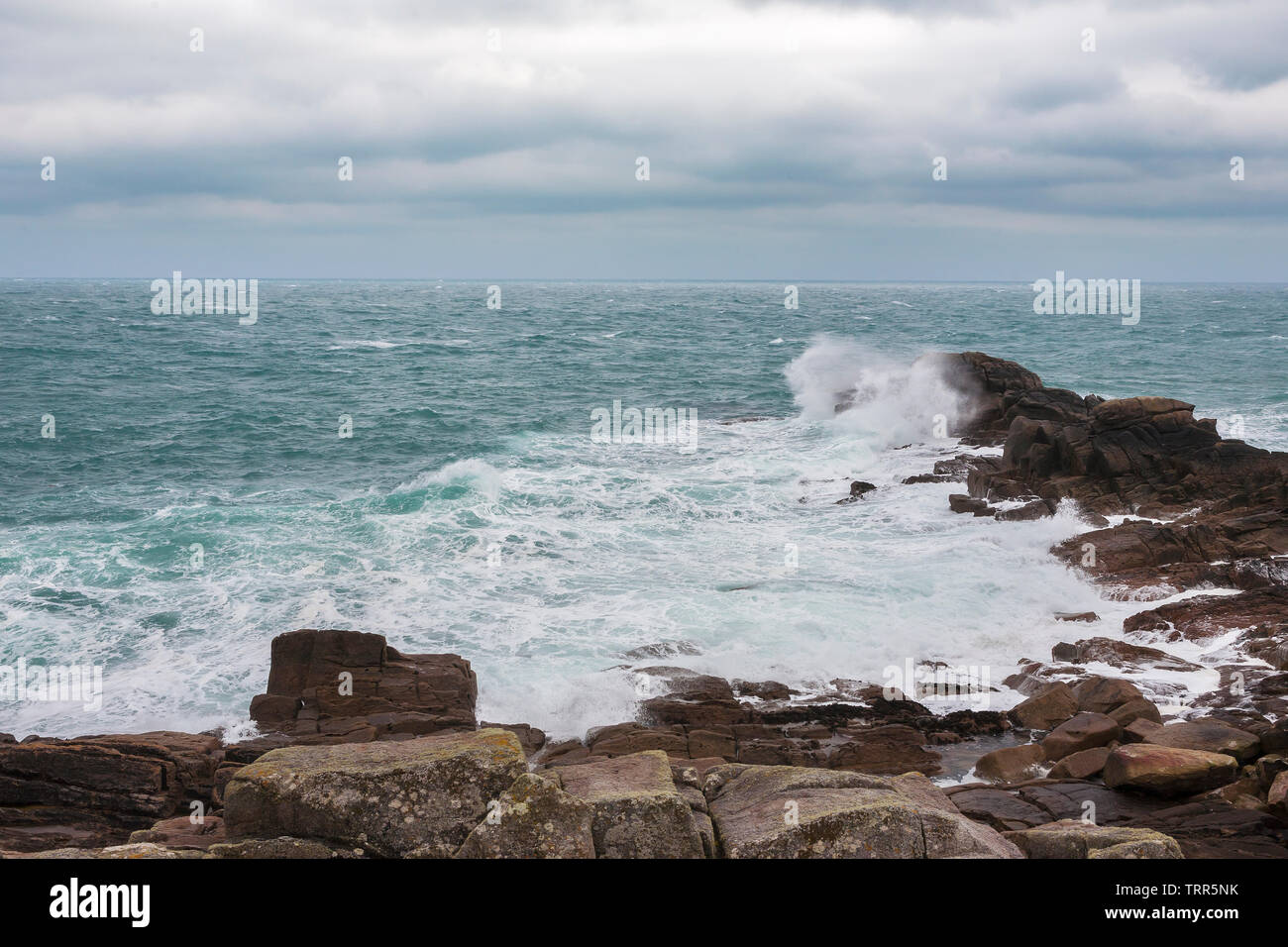 Porth Hellick Point at low tide and in a strong onshore wind, St. Mary's, Isles of Scilly, UK Stock Photo