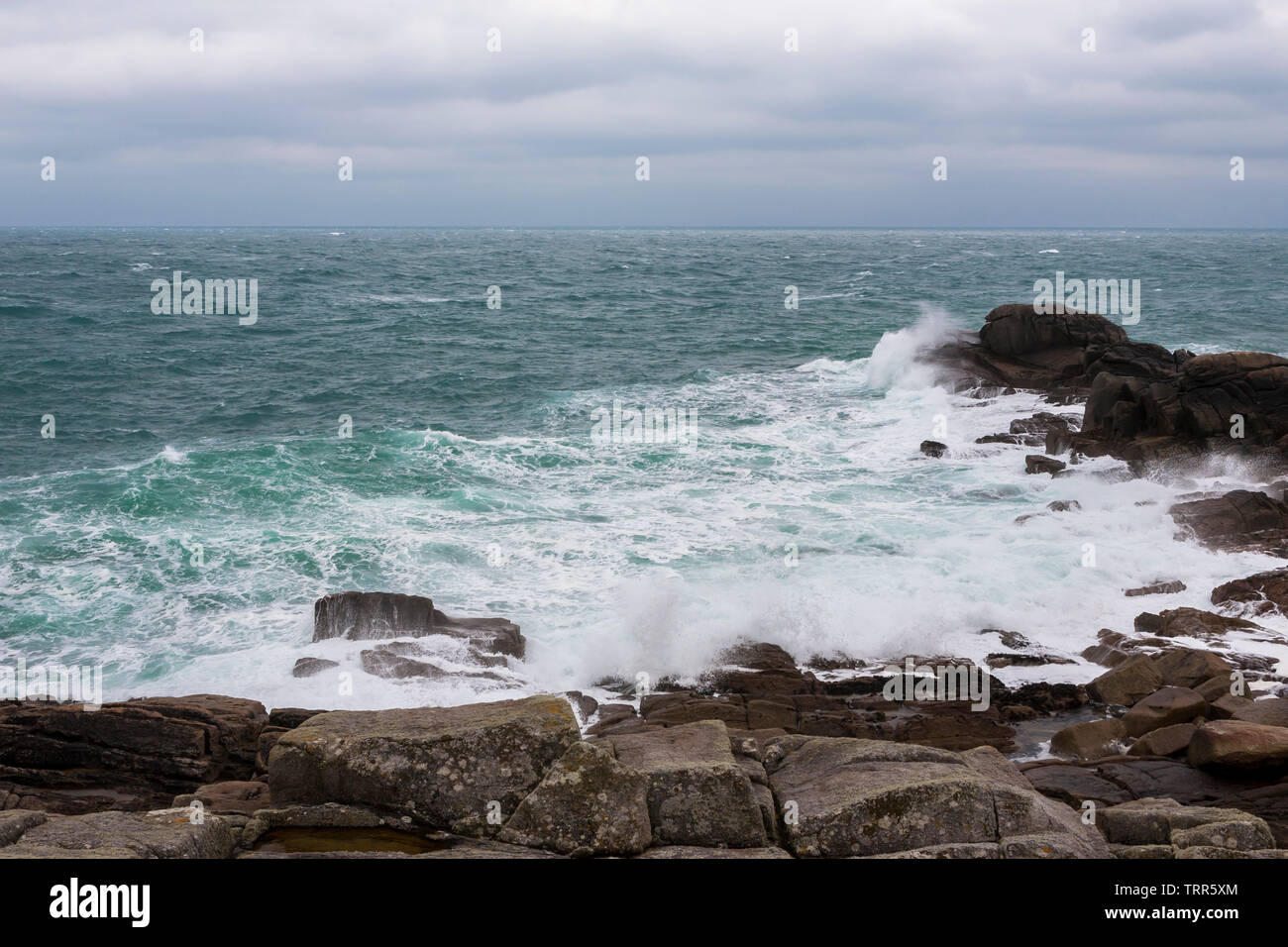 Porth Hellick Point at low tide and in a strong onshore wind, St. Mary's, Isles of Scilly, UK Stock Photo