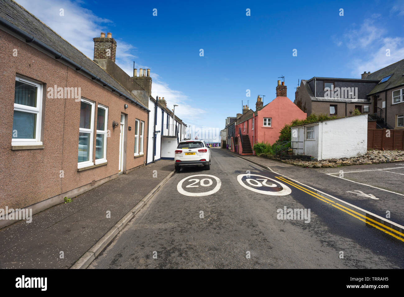 Traditional colourful terraced houses in the past belonging to