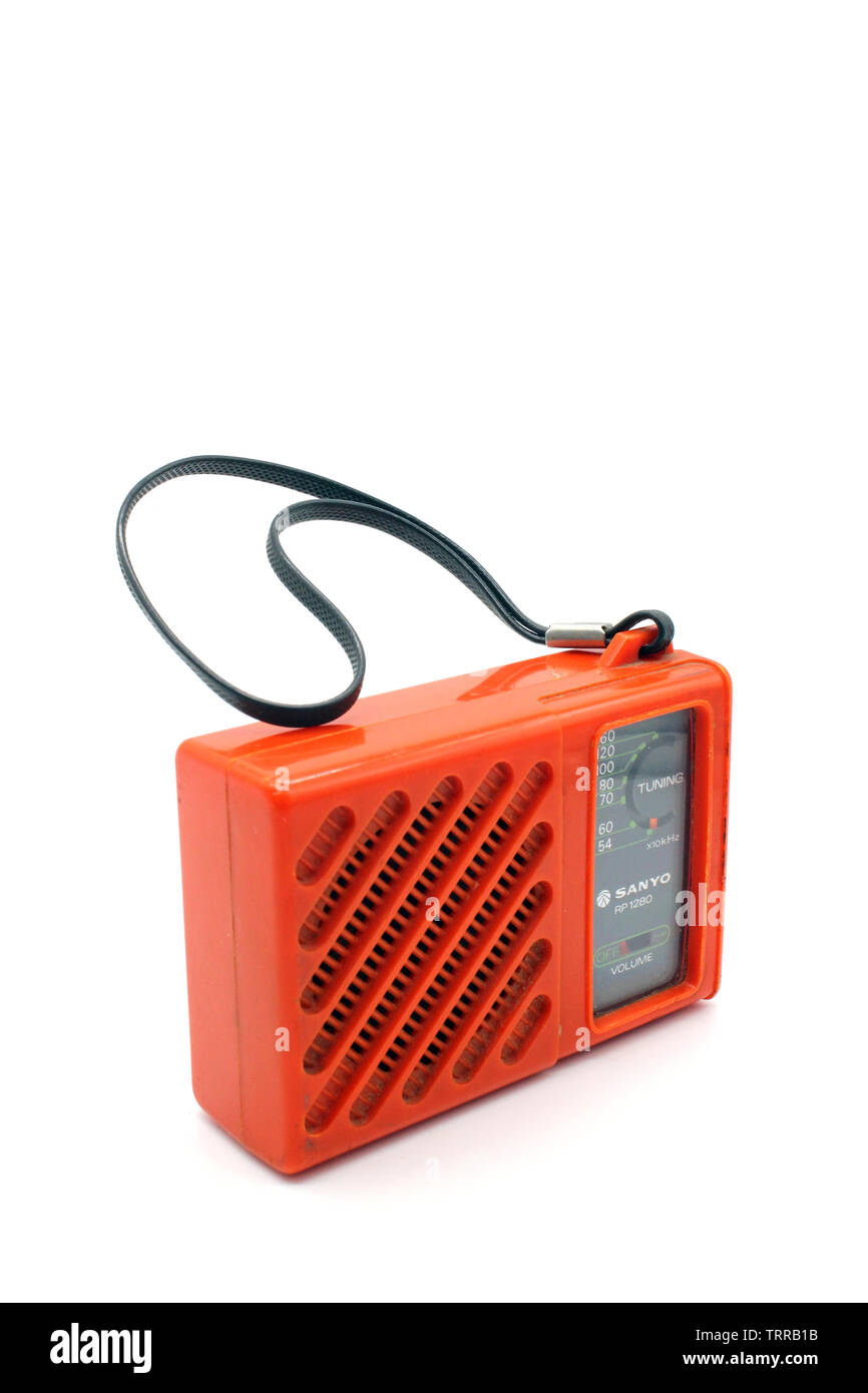 Vintage orange Sanyo plastic portable transistor radio, isolated on a white  background Stock Photo - Alamy