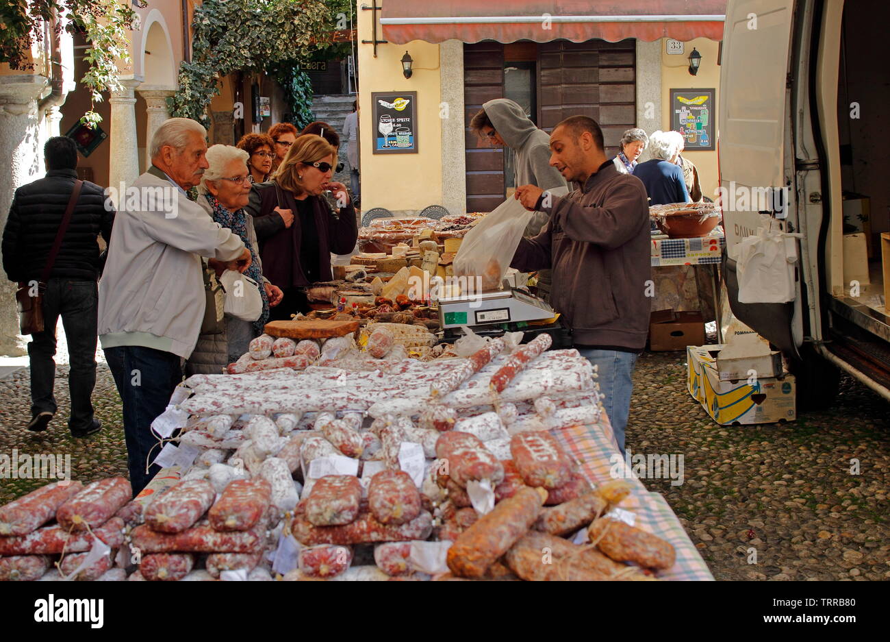 Italy Piedmont lakes area Orta San Giulio Lago d' Giulio Italian Alps salami sausage for sale in Wednesday market Stock Photo